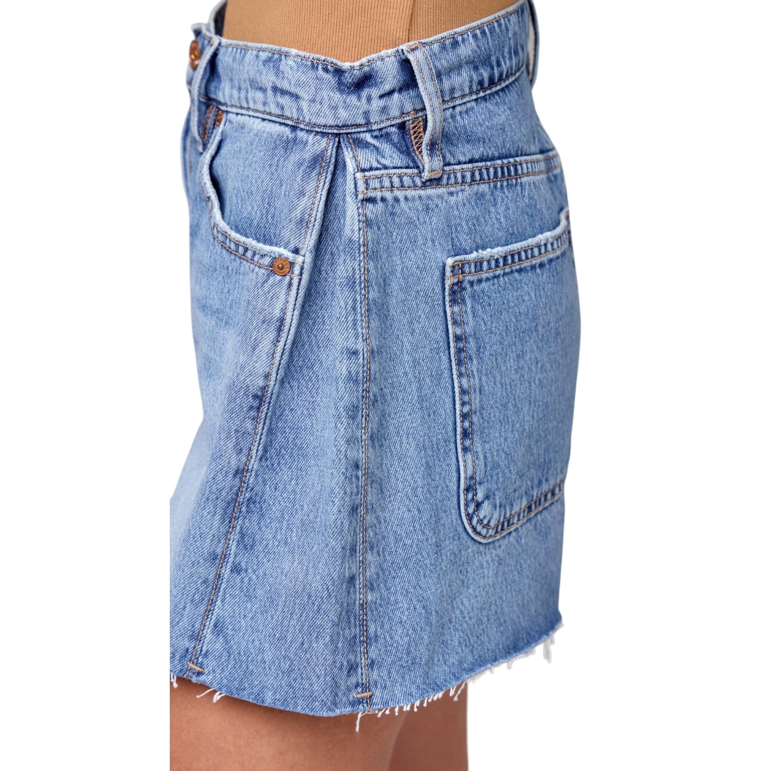 Blue denim skirt on a white background