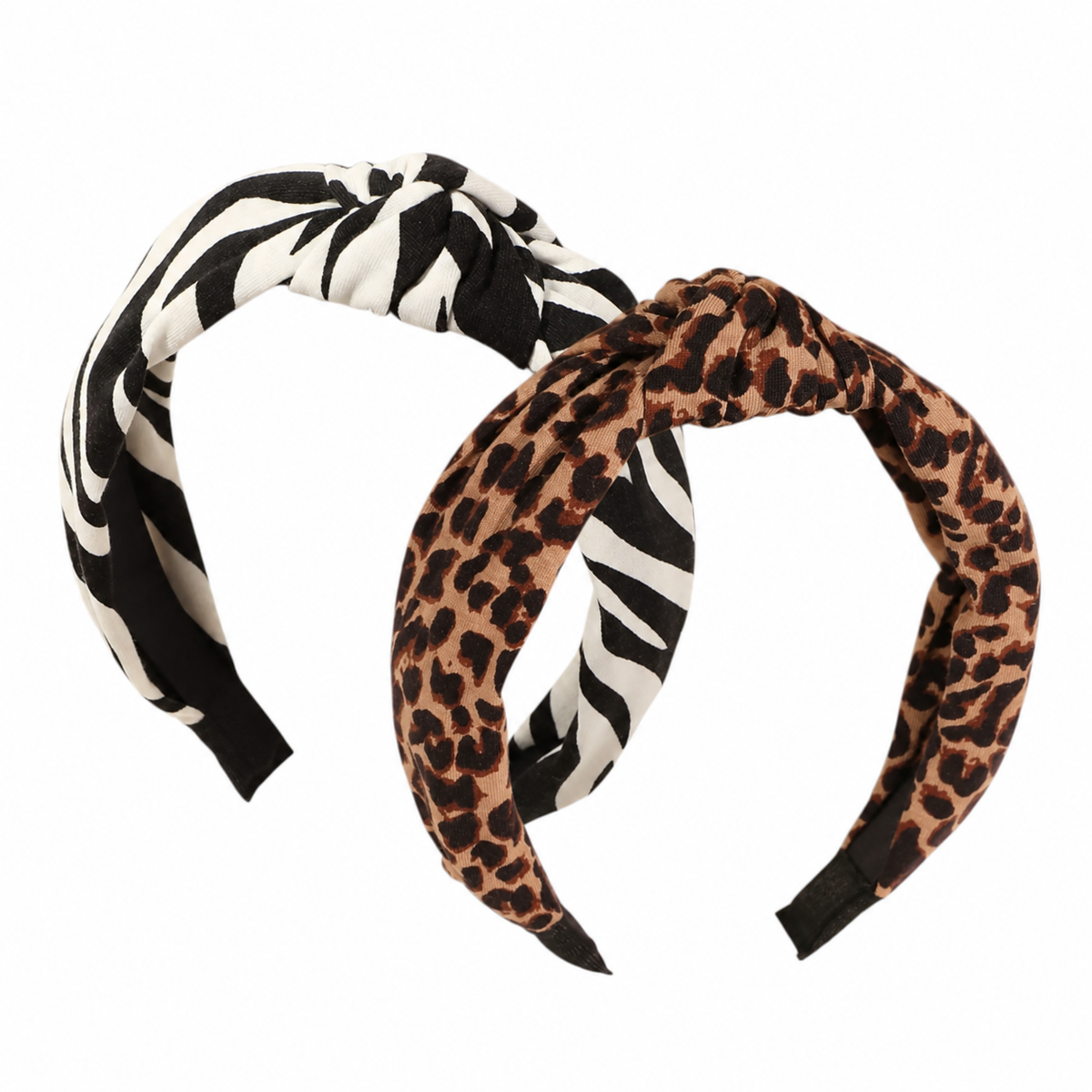 Two fabric twist-front headbands on a plain white background. One headband has a black and white zebra print, and the other has a brown, black, and beige leopard print.