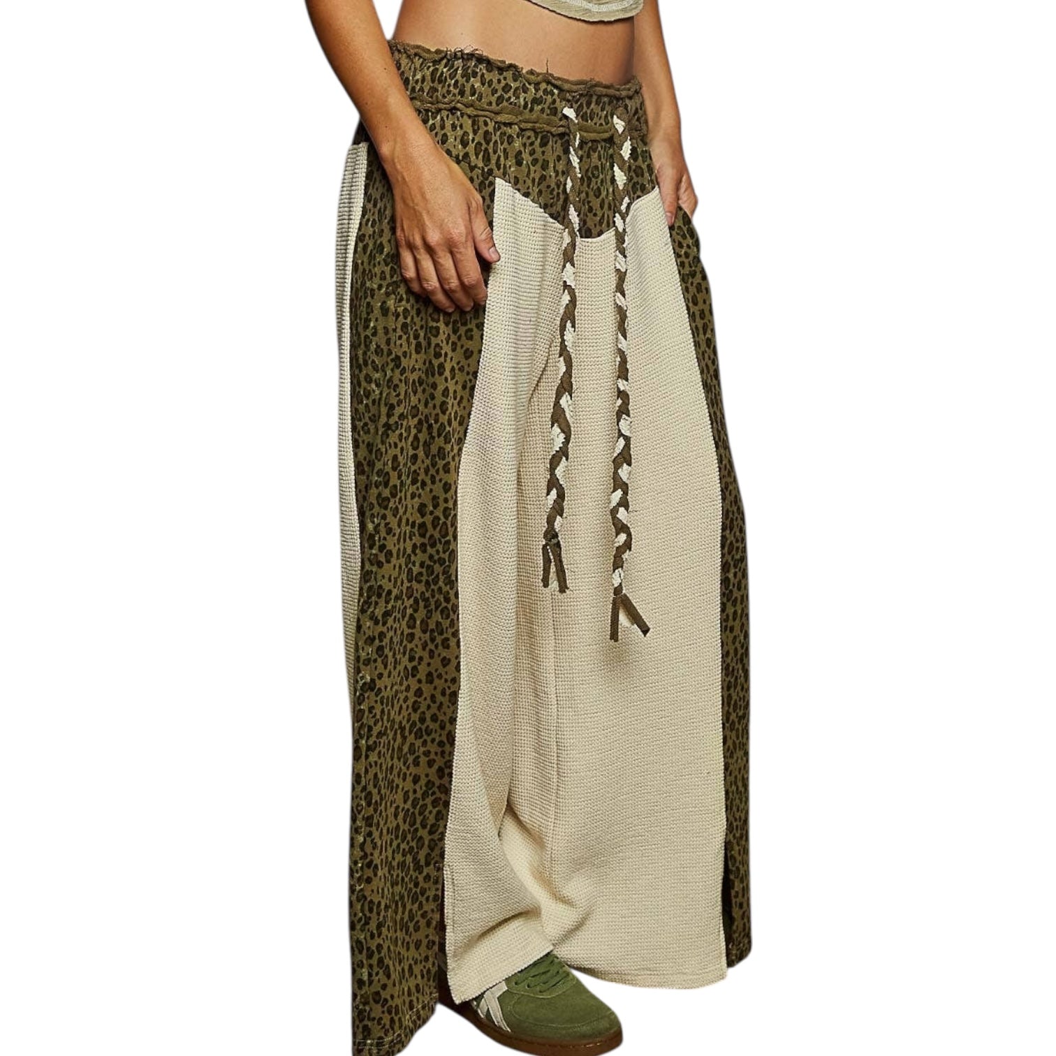 Two-layered skirt with leopard print and beige fabric on a white background