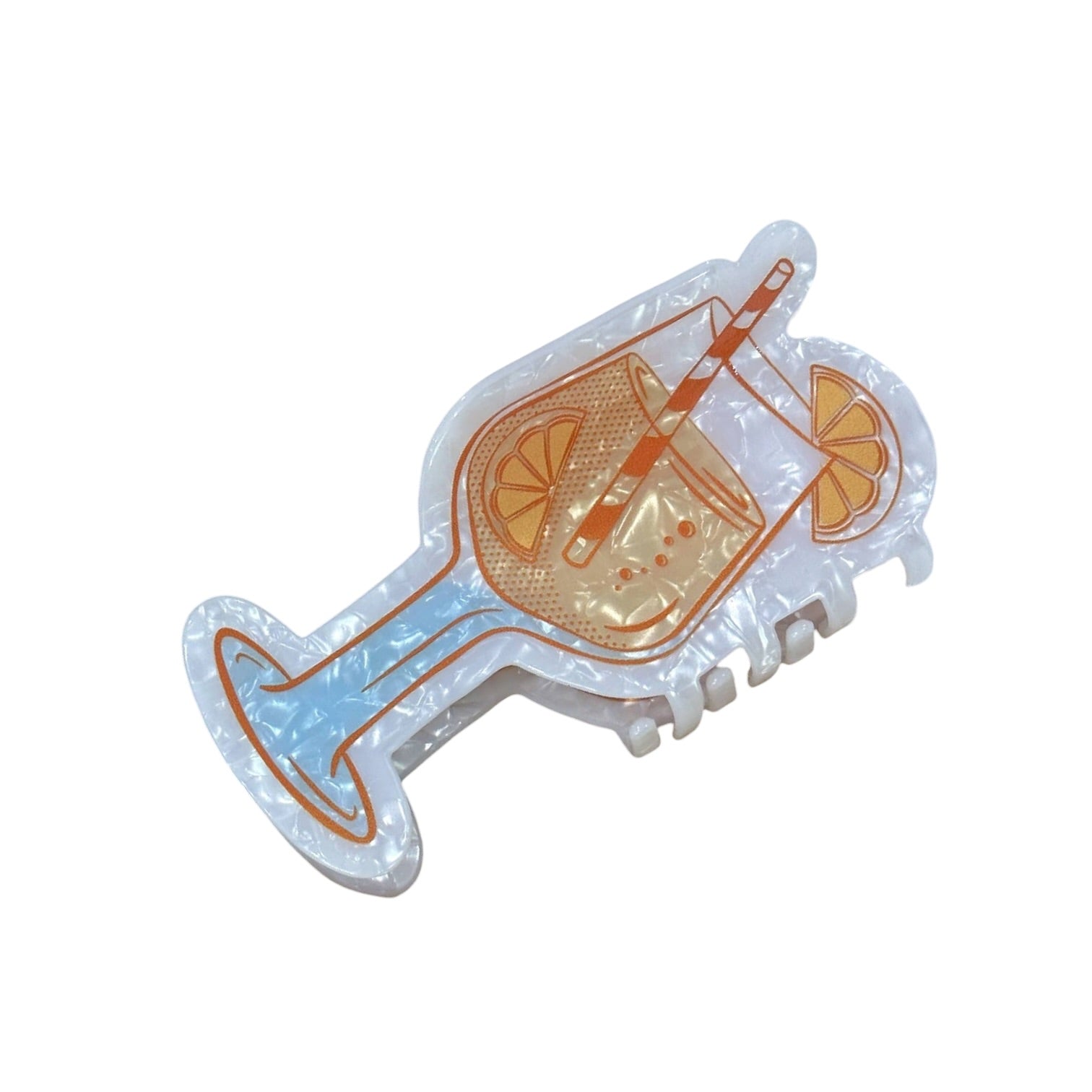 Decorative hair clip with a drink design on a white background