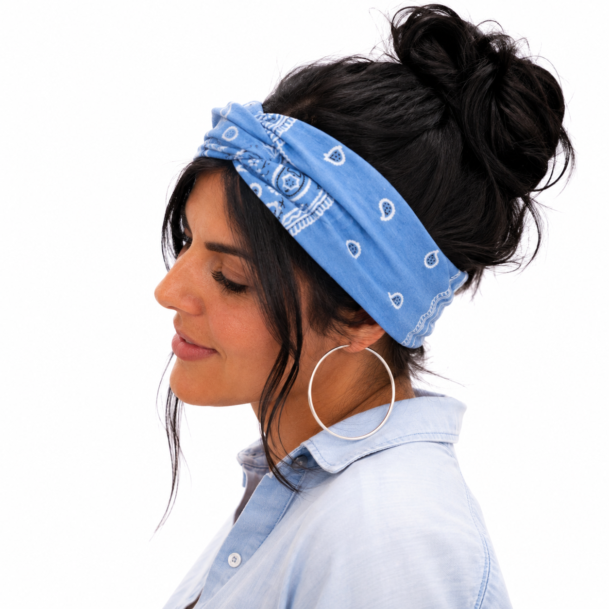 Blue bandana with white patterns on a white background
