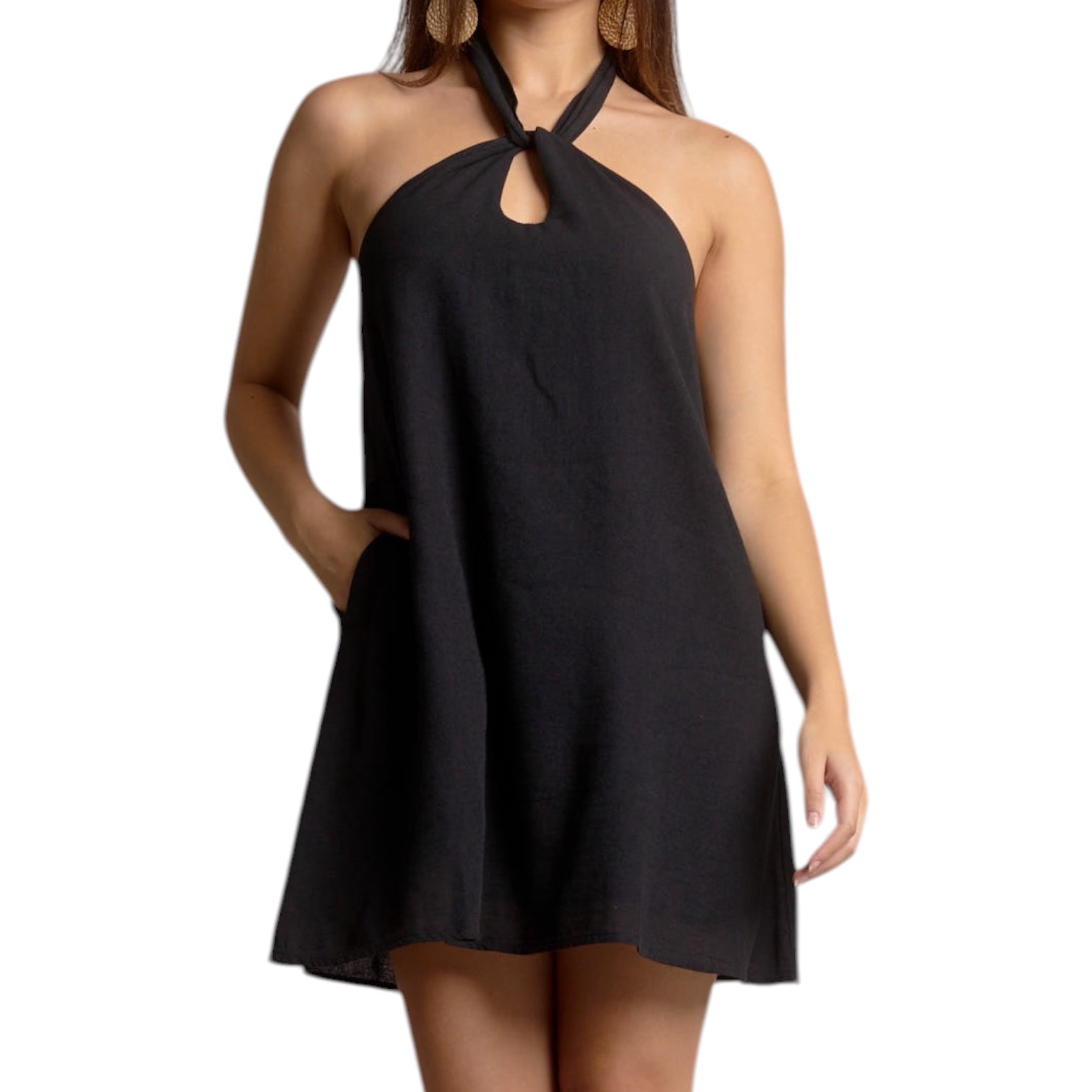 Black halter neck dress worn by a model on a white background
