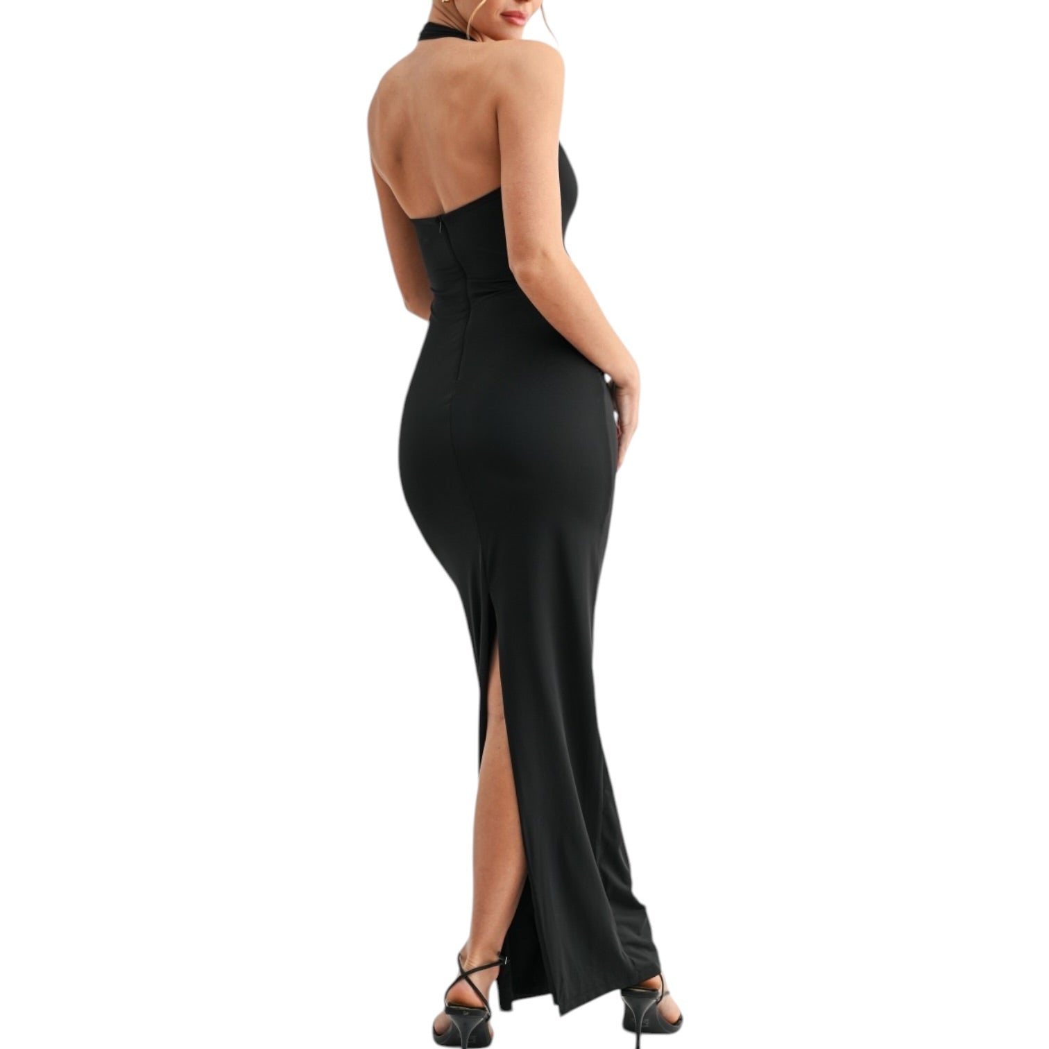 Black halter neck gown with a slit on a white background
