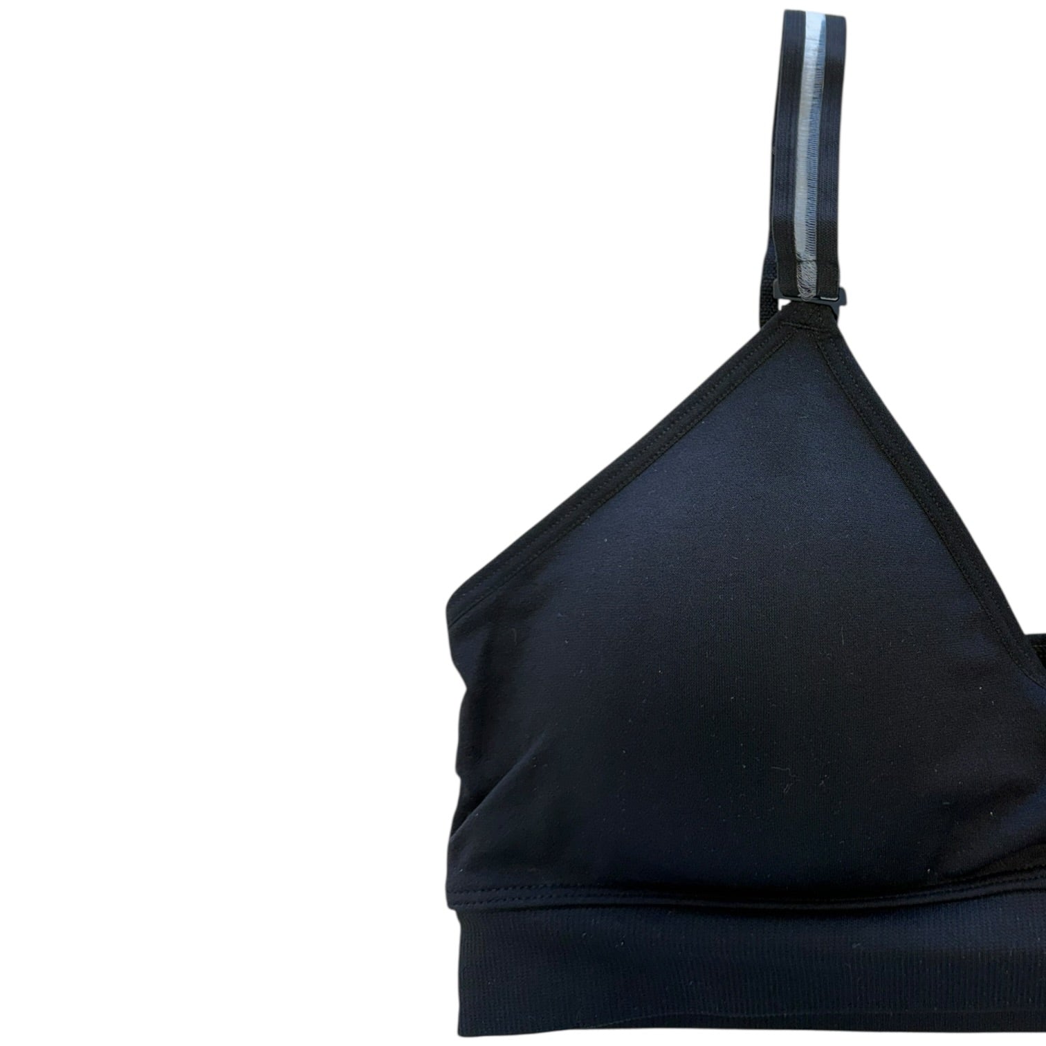 Black bra top with thin straps on a white background