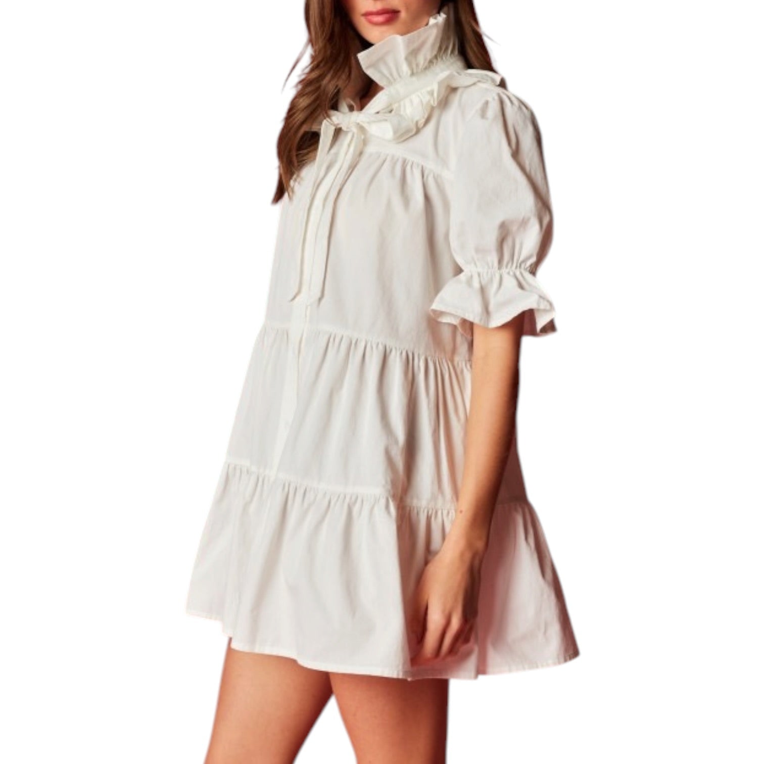 White dress with ruffled details on a white background