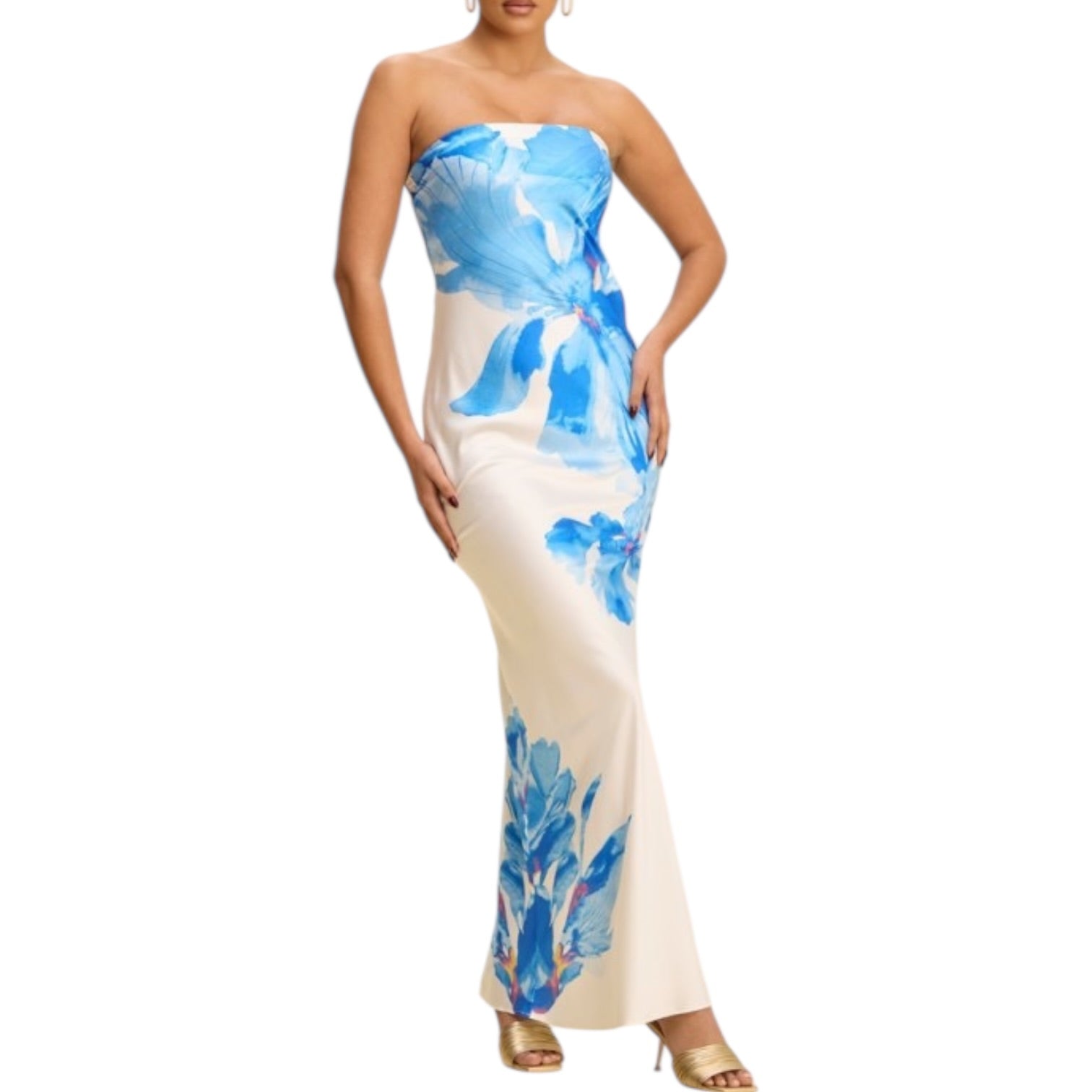 Woman wearing a strapless dress with blue floral pattern on a white background