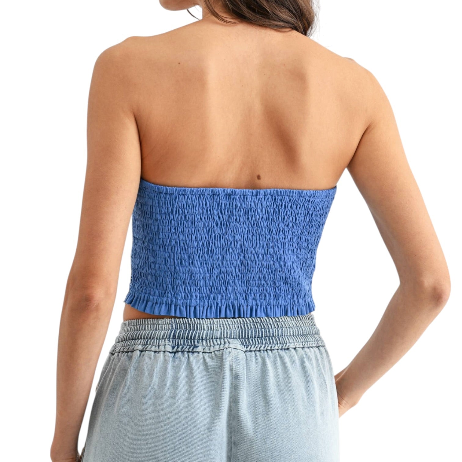 Blue strapless top worn by a person on a white background