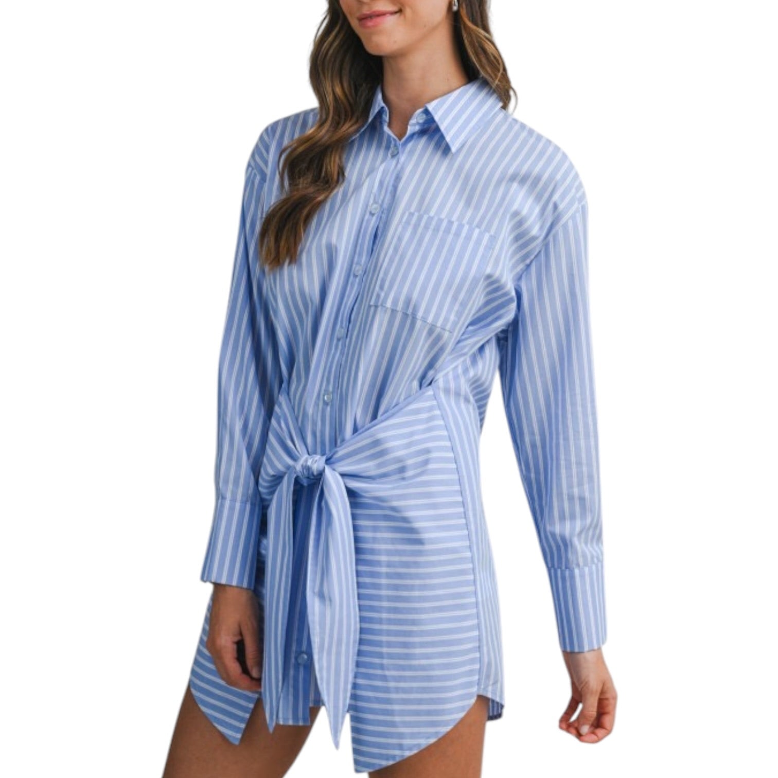 Woman wearing a blue and white striped shirt dress on a white background