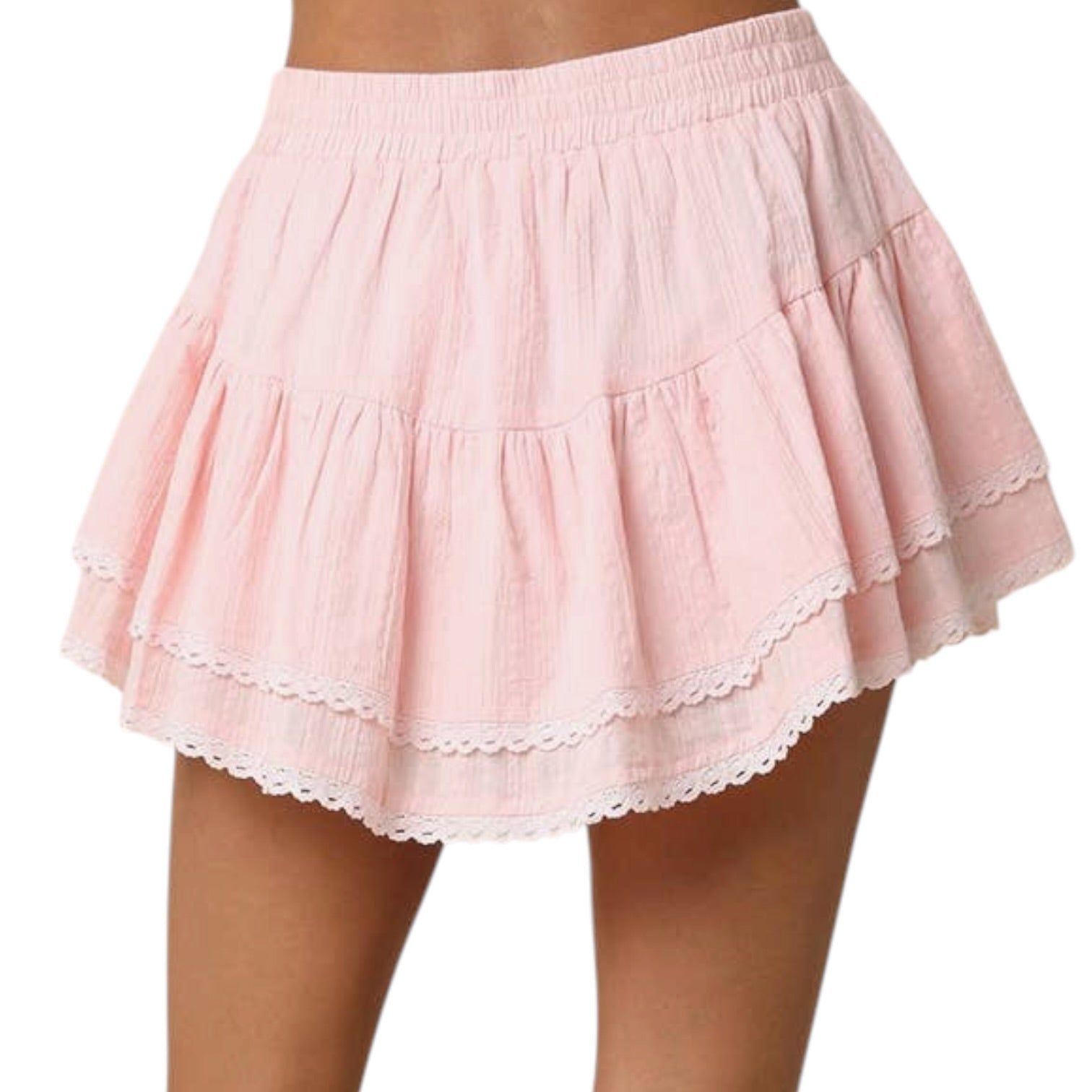 Pink skirt with lace trim on a white background