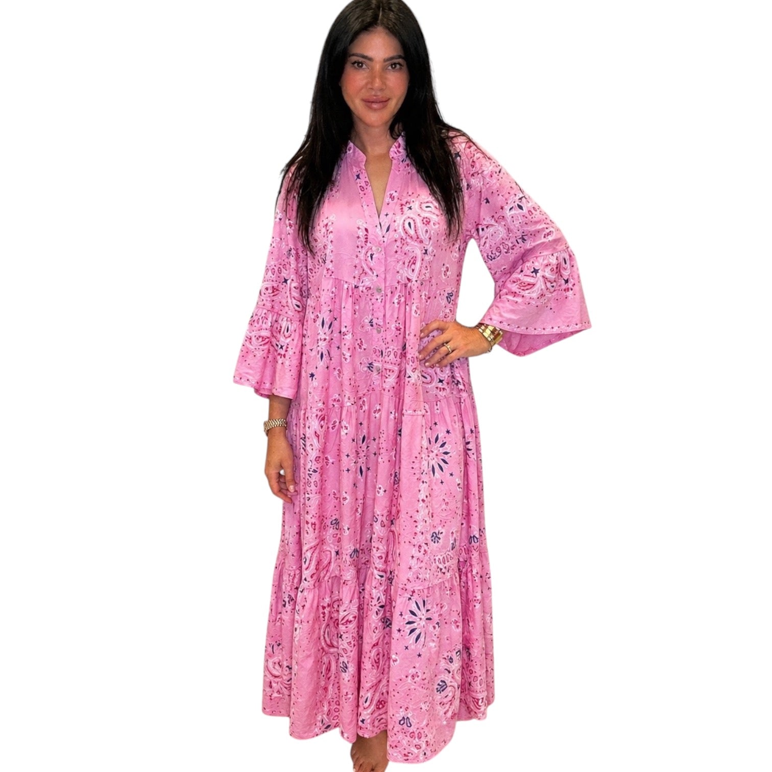 Woman wearing a pink floral dress on a white background