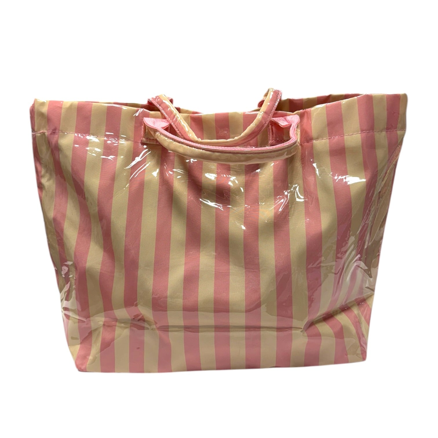 Pink and beige striped tote bag on a white background