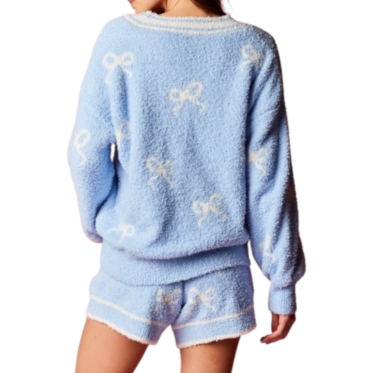 Light blue set with bow patterns on a white background