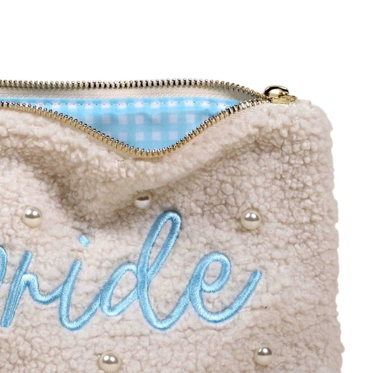 Beige pouch with 'bride' embroidery and pearl embellishments on a white background