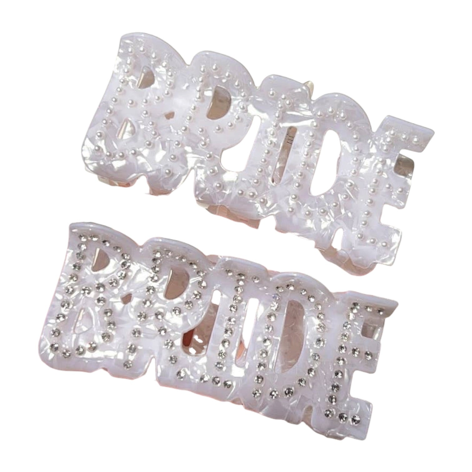 Two 'Bride' hair clips with rhinestone embellishments on a white background