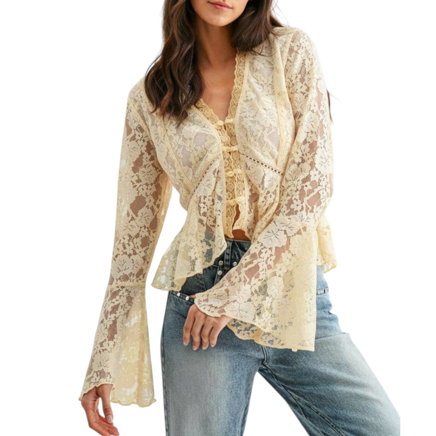Woman wearing a lace top and jeans on a white background