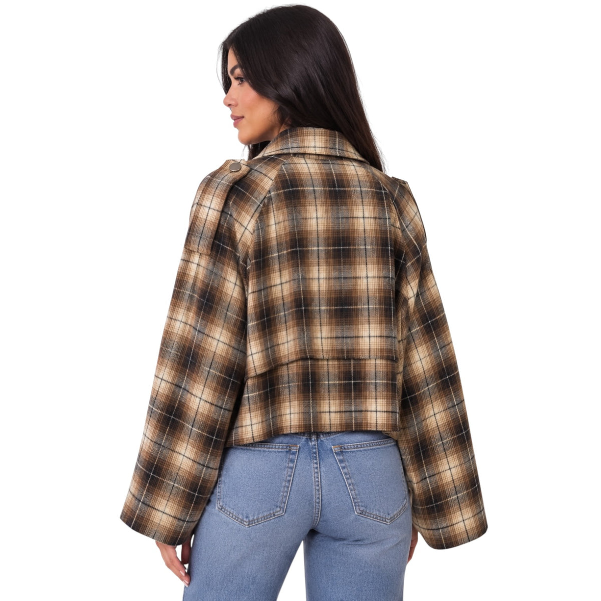 A woman shown from the back wearing a cropped long-sleeve plaid jacket in brown, beige, and black, paired with light blue jeans, against a plain white background.