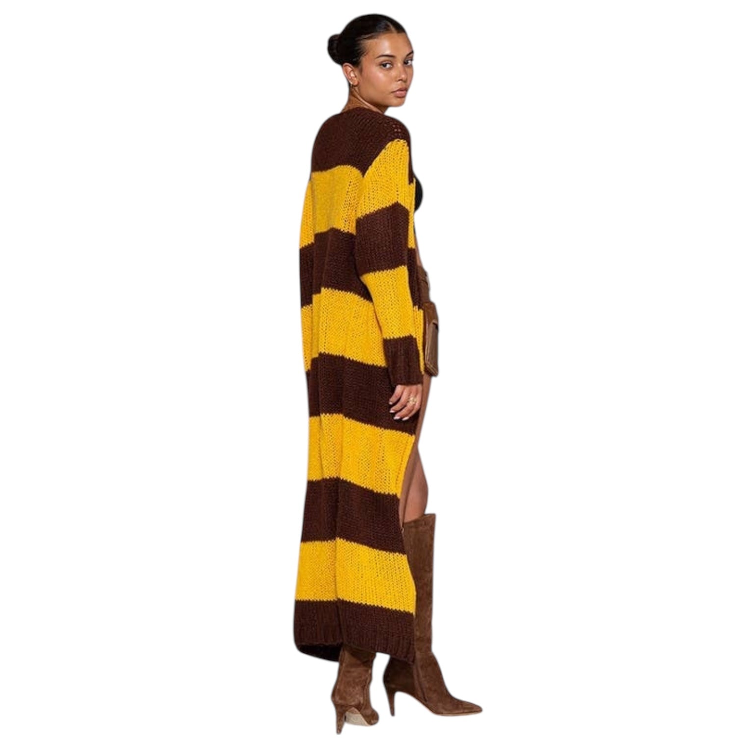 Woman wearing a long brown and yellow striped dress on a white background