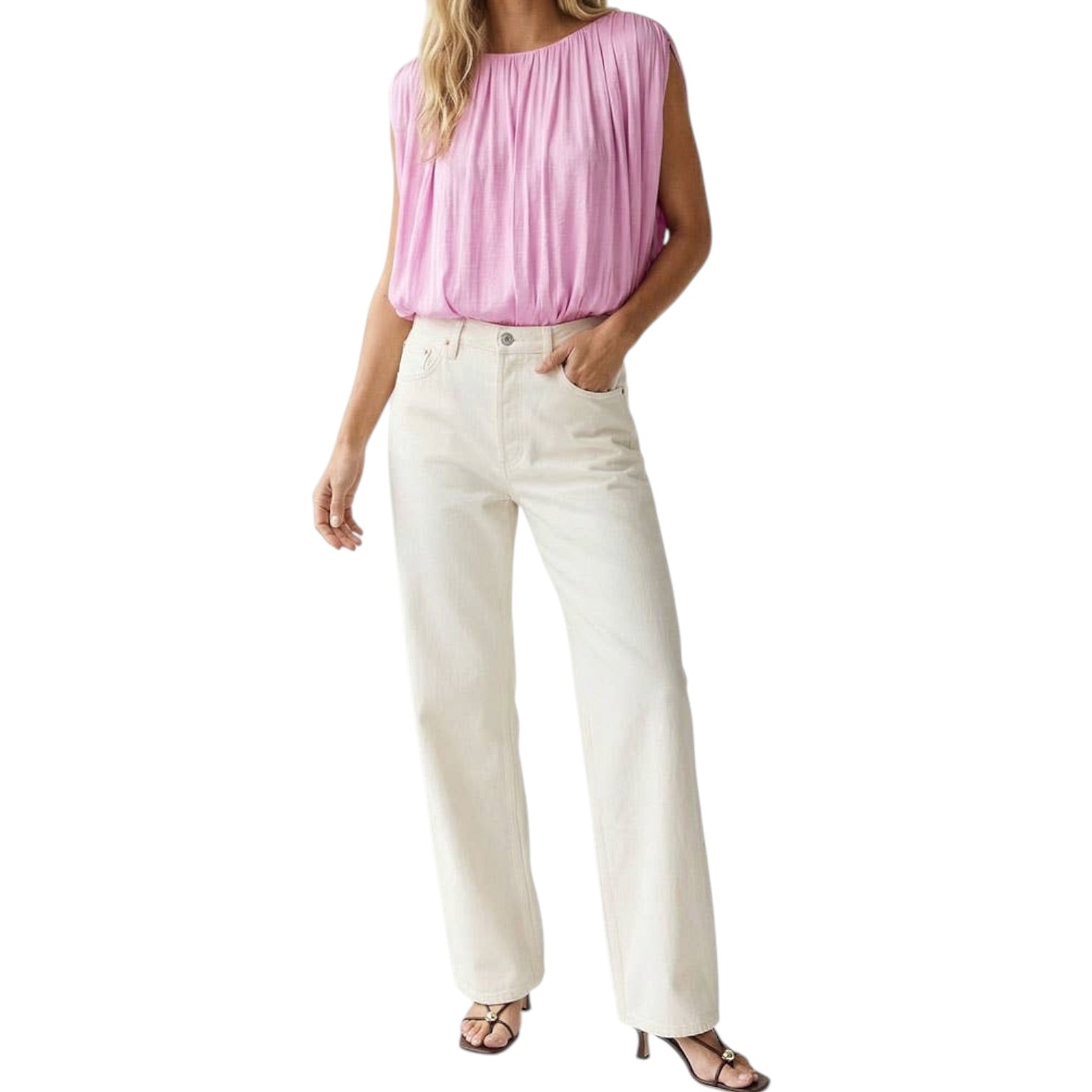 Person wearing a lilac sleeveless top on a white background