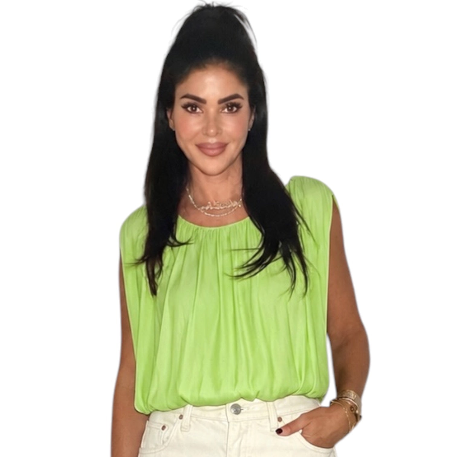 Woman wearing a bright green sleeveless top on a white background