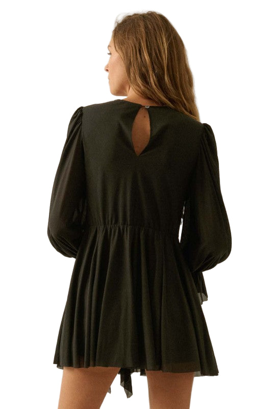 Black romper with long sleeves and open back on white background