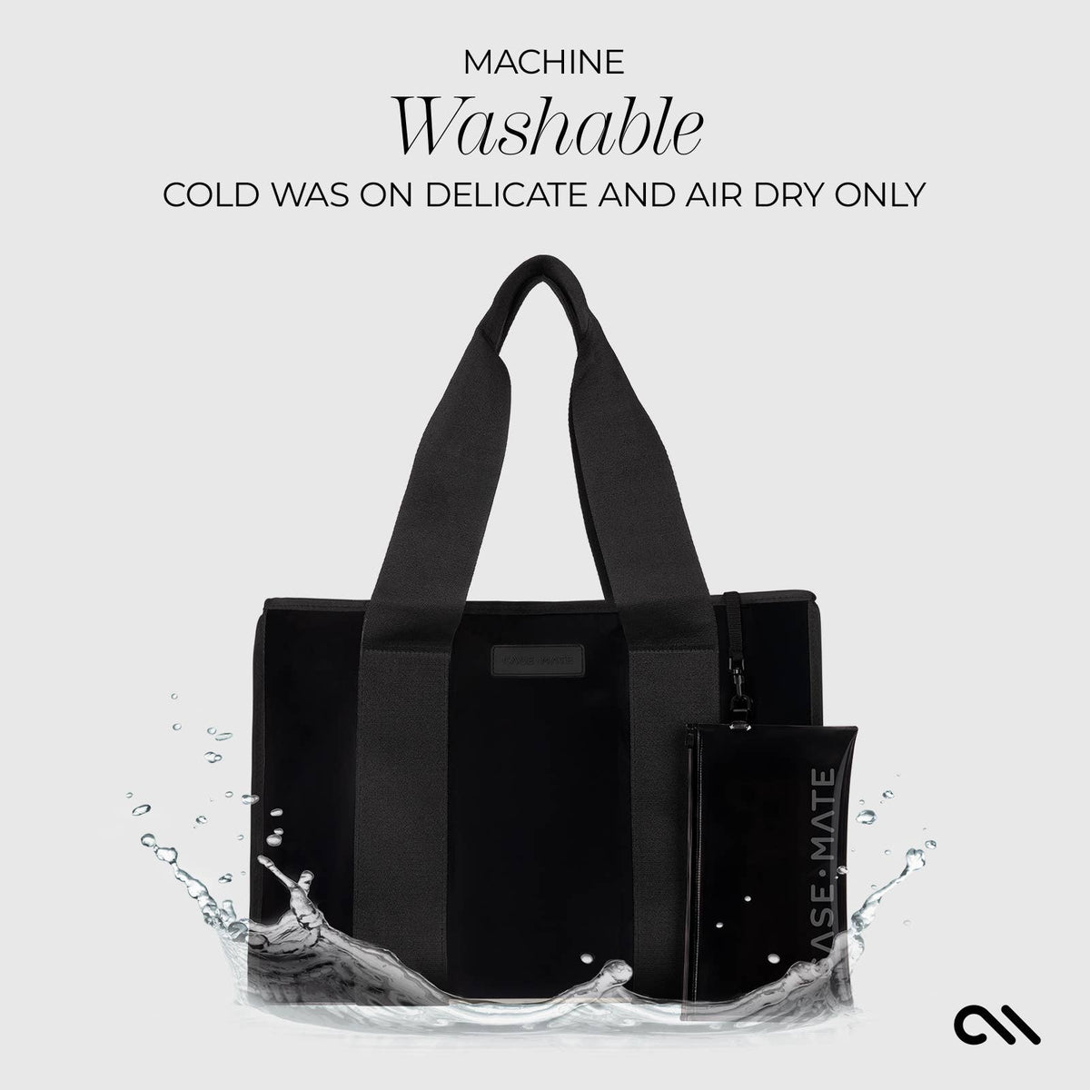 Black tote bag with water splashes on a light gray background, featuring washing instructions.