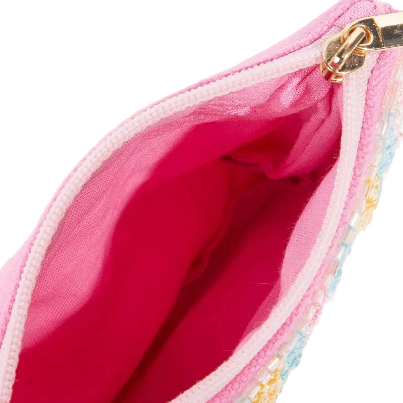 Close-up of a pink pouch with colorful embroidery on a white background