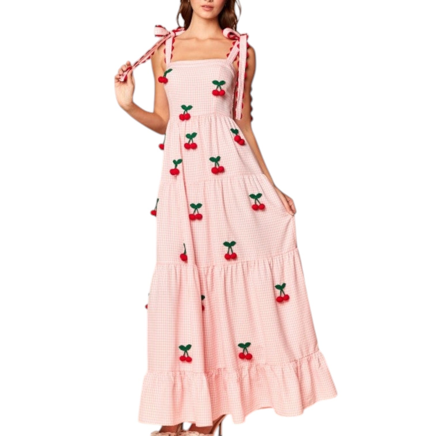 Pink dress with cherry designs on a white background