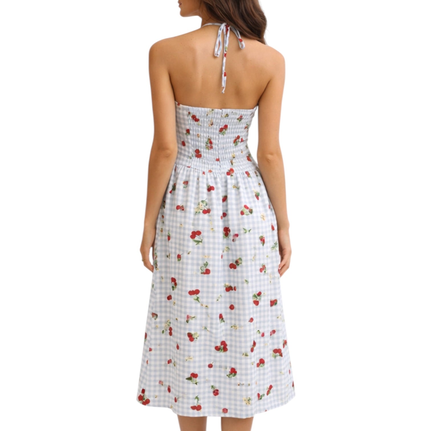 Woman wearing a white dress with red floral patterns on a white background
