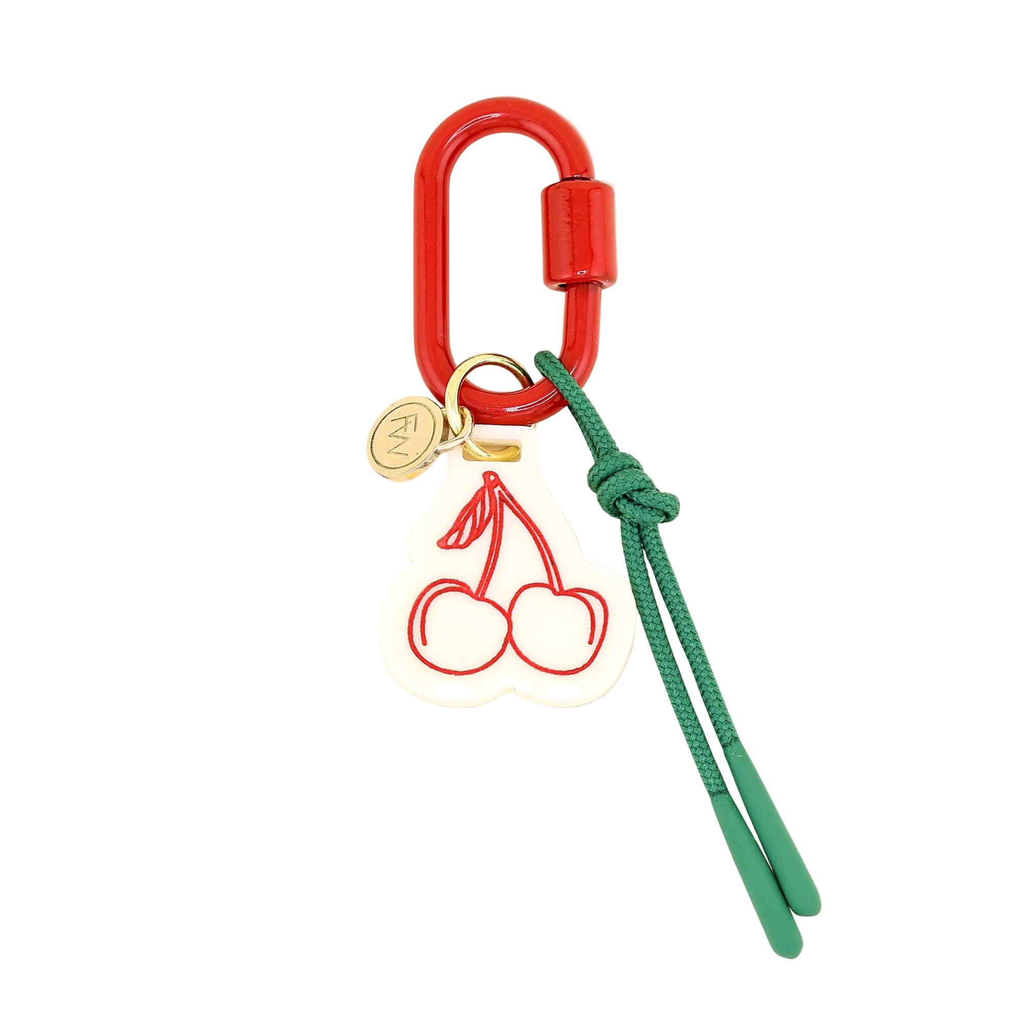 Keychain with red carabiner, green strap, and cherry design on a beige background