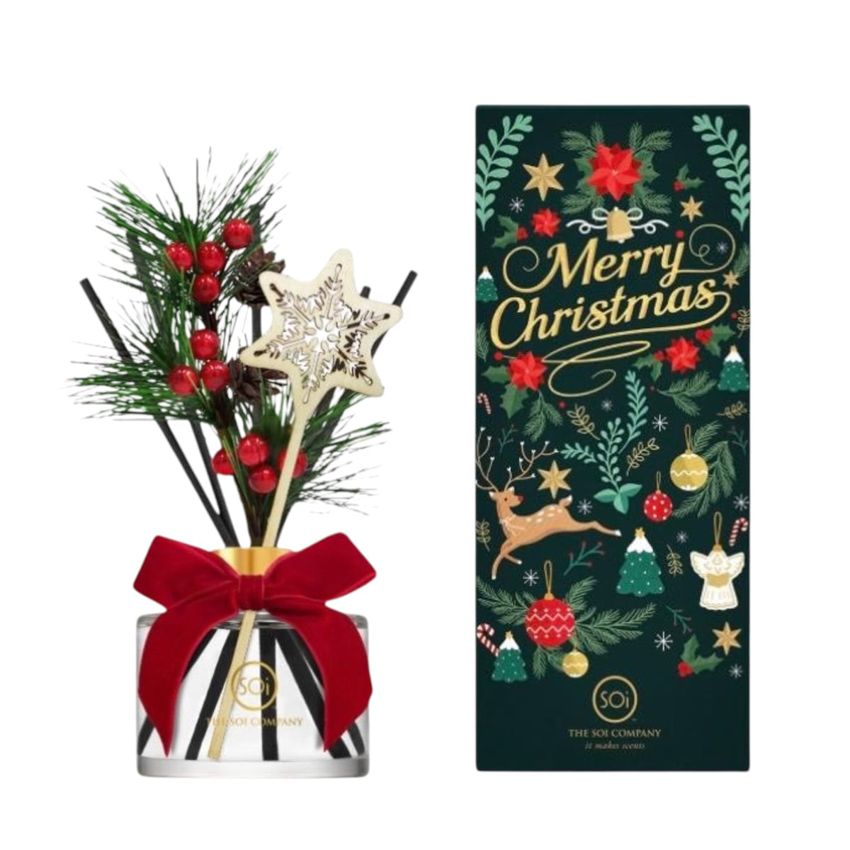 A festive Christmas reed diffuser set with a clear glass bottle, black-and-white striped base, red ribbon bow, and decorative reeds including pine branches, red berries, and a gold star wand, shown beside its dark green printed box with gold 'Merry Christmas' lettering and holiday illustrations.