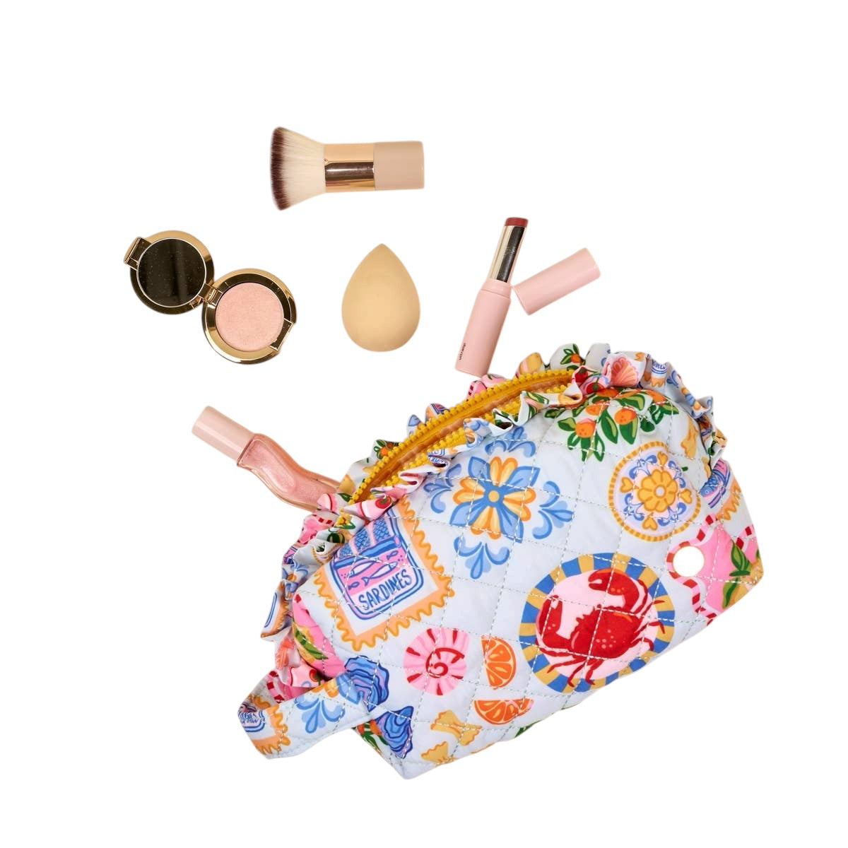 Colorful floral-patterned makeup bag with various makeup items on a white background