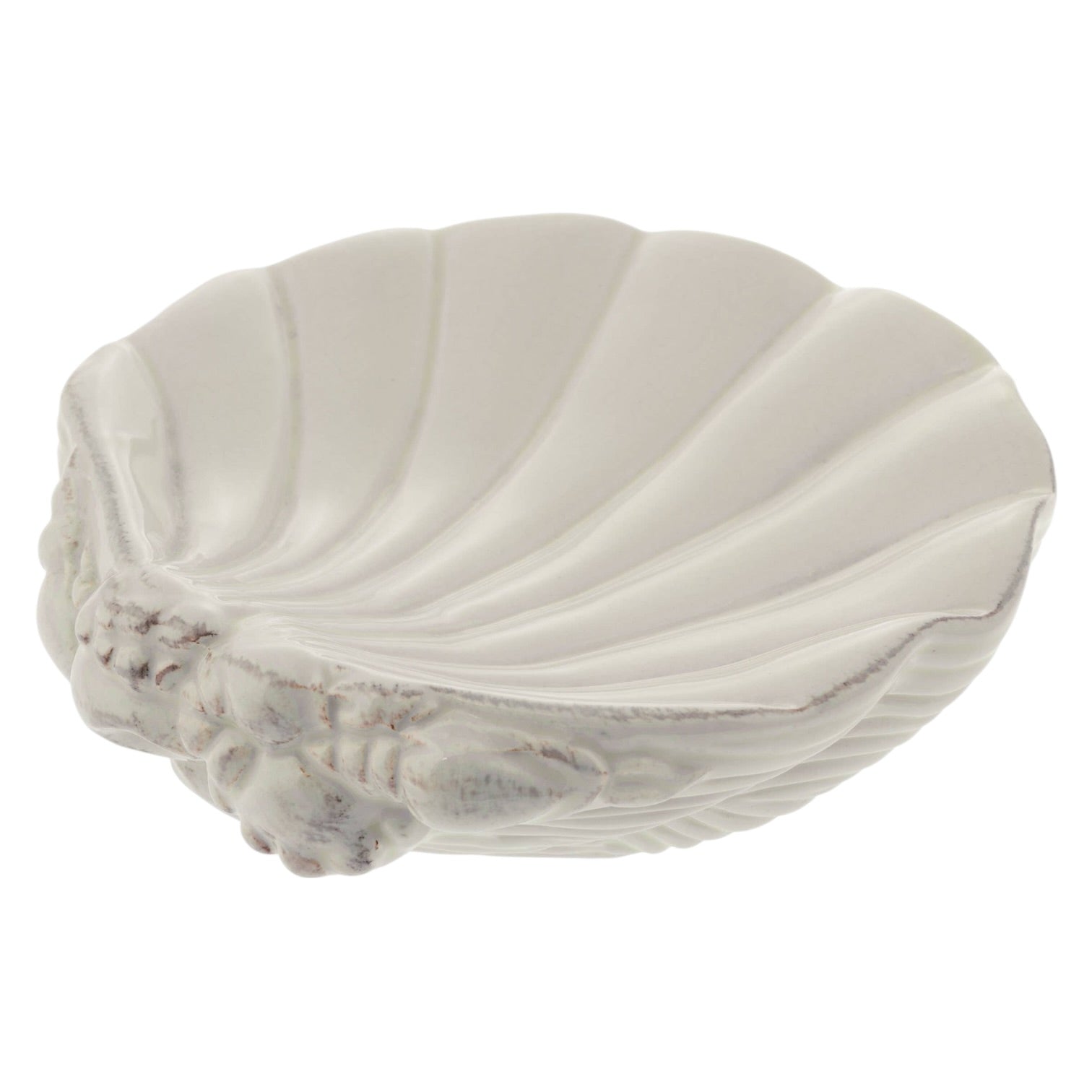 Decorative shell-shaped bowl on a white background