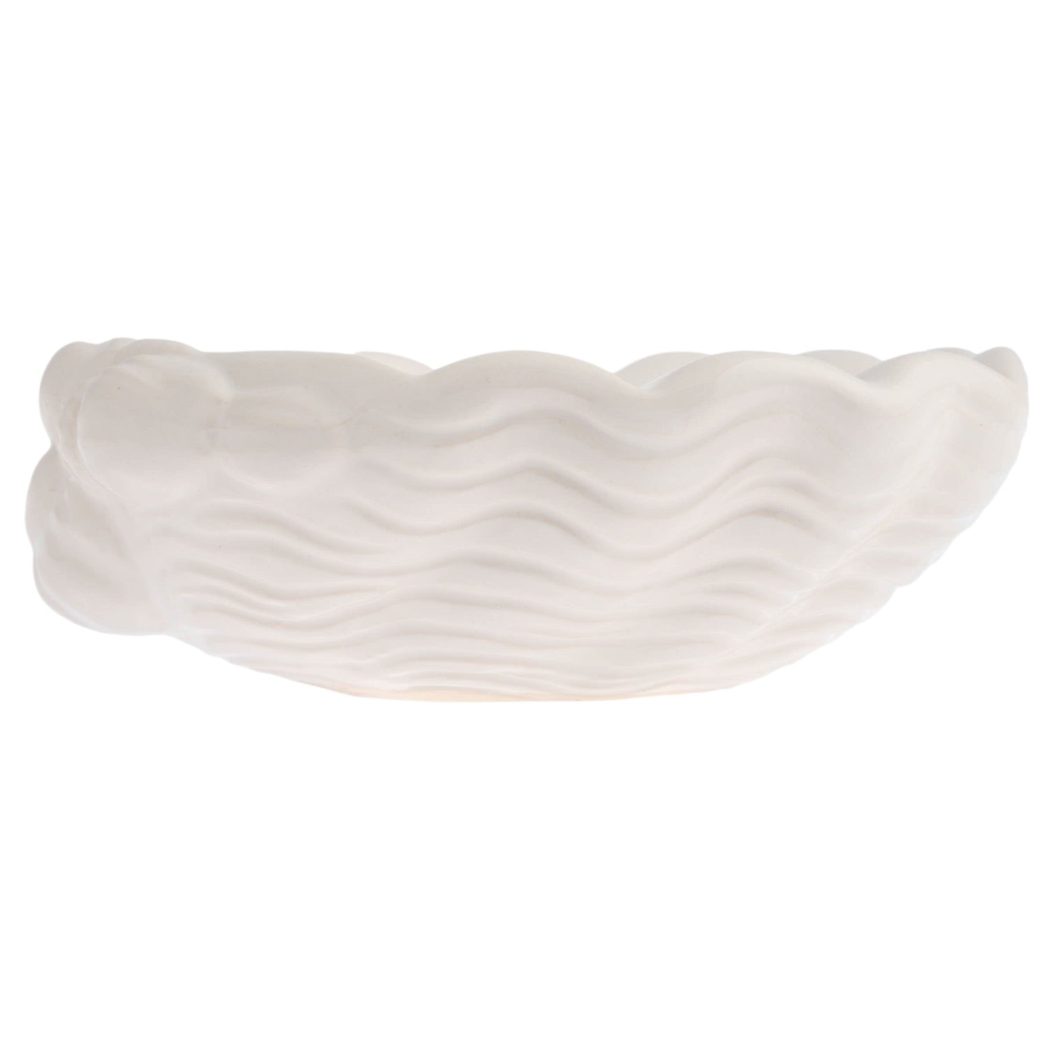White ceramic bowl with wavy texture on a white background