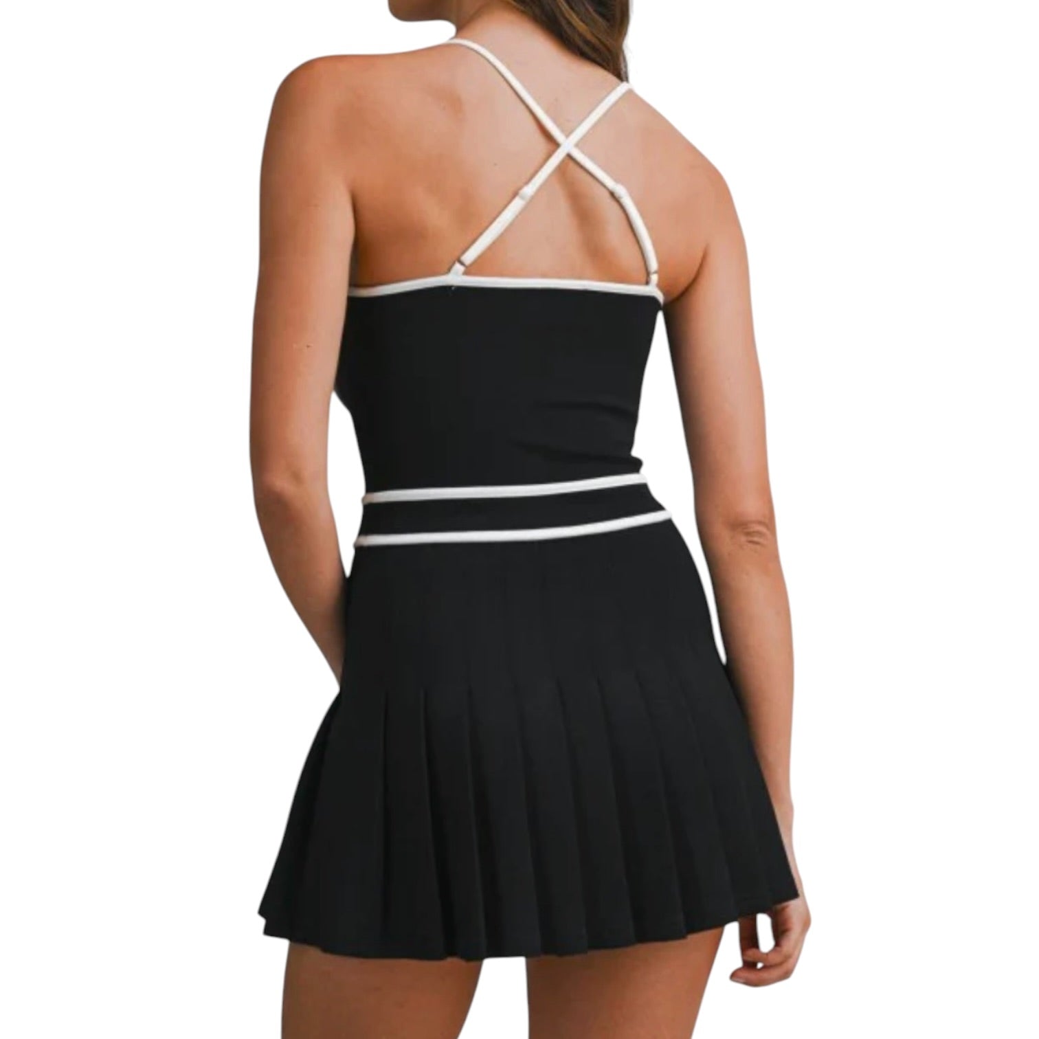Black dress with white straps on a white background