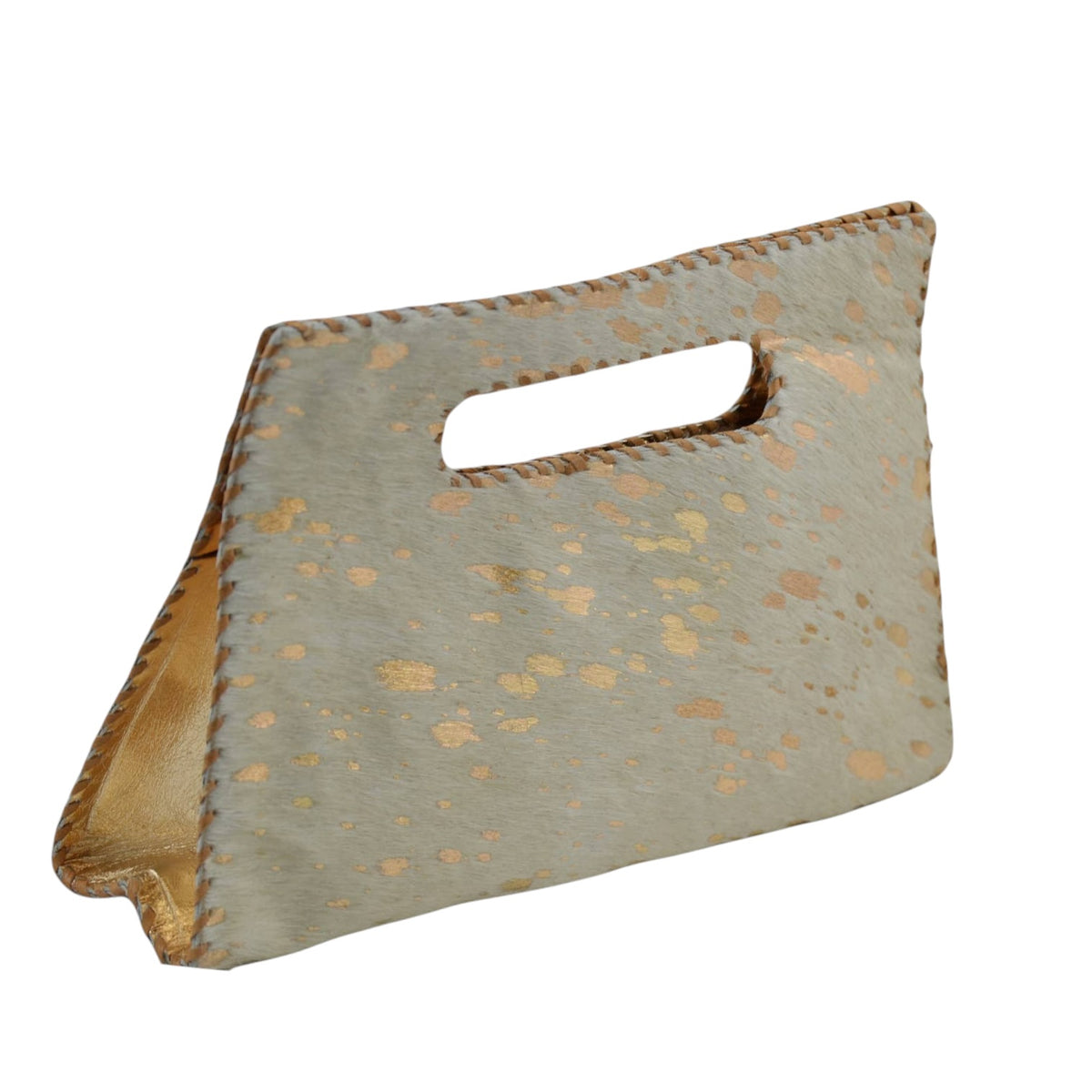 A rectangular handbag made of textured cowhide with a cutout handle, featuring a speckled pattern of metallic gold spots on a light gray base, with visible whipstitching along the edges.