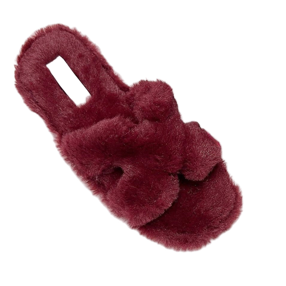 Maroon fuzzy sandal on a white background