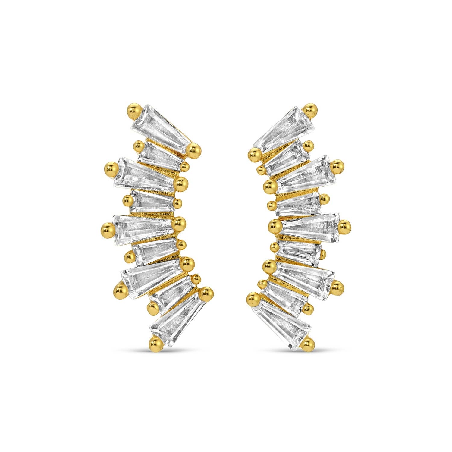 Gold and diamond earrings on a white background