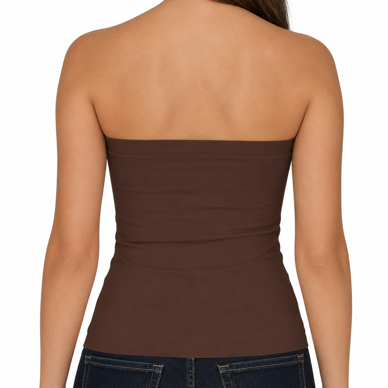 Rear view of a woman wearing a brown strapless bandeau-style top with dark blue jeans against a plain white background.