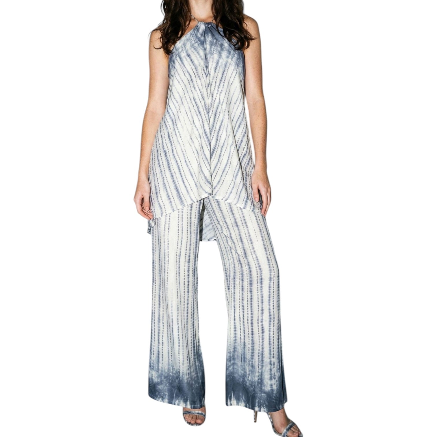 Woman wearing a tie-dye set on a white background