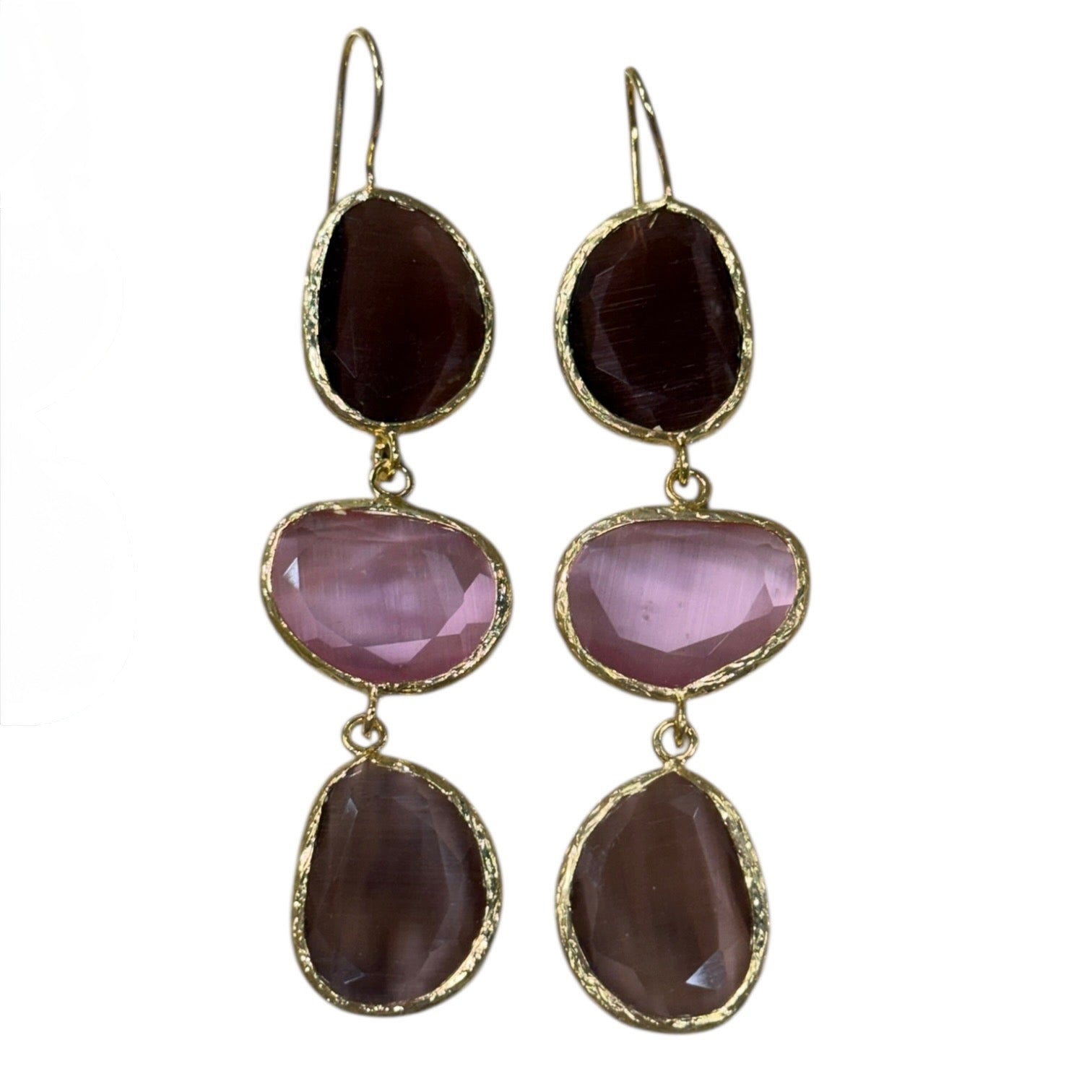 Pair of earrings with gold accents and layered gemstones on a white background