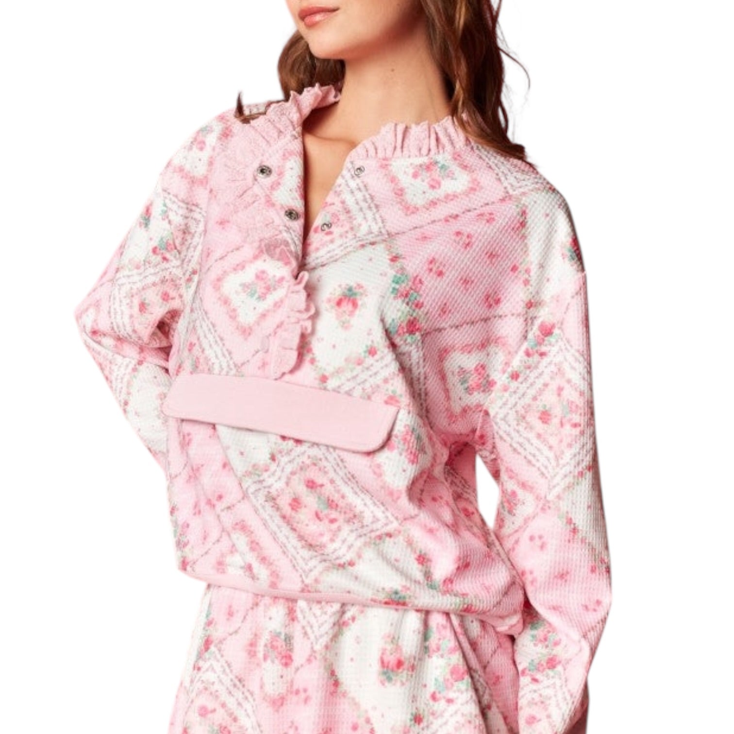 Pink floral top on a white background