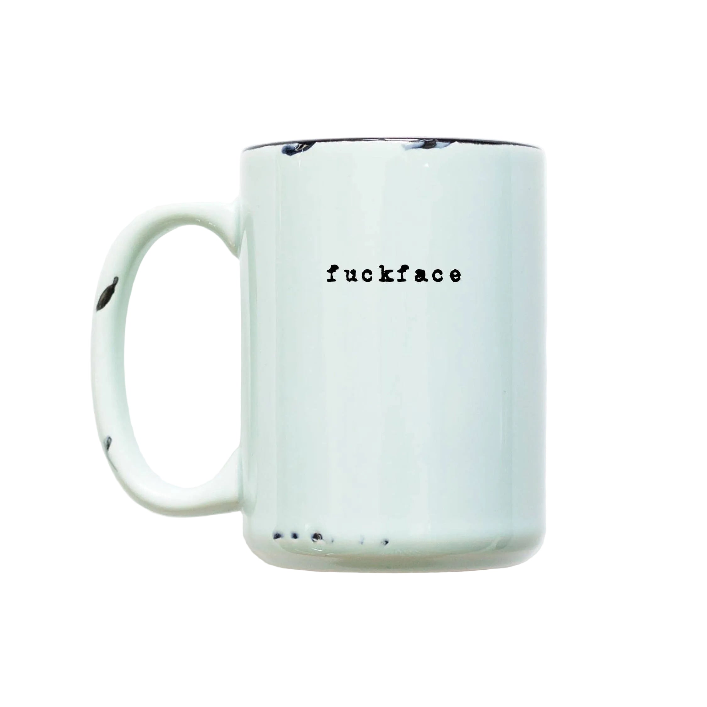 Mint green mug with 'fuckface' text on a white background