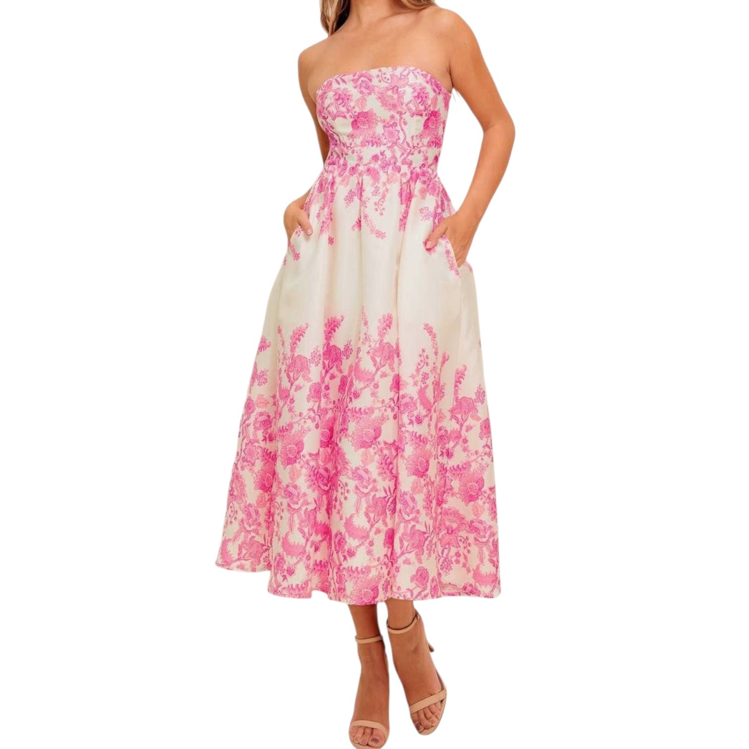 a woman wearing an ivory pink floral dress with pocket on white background.