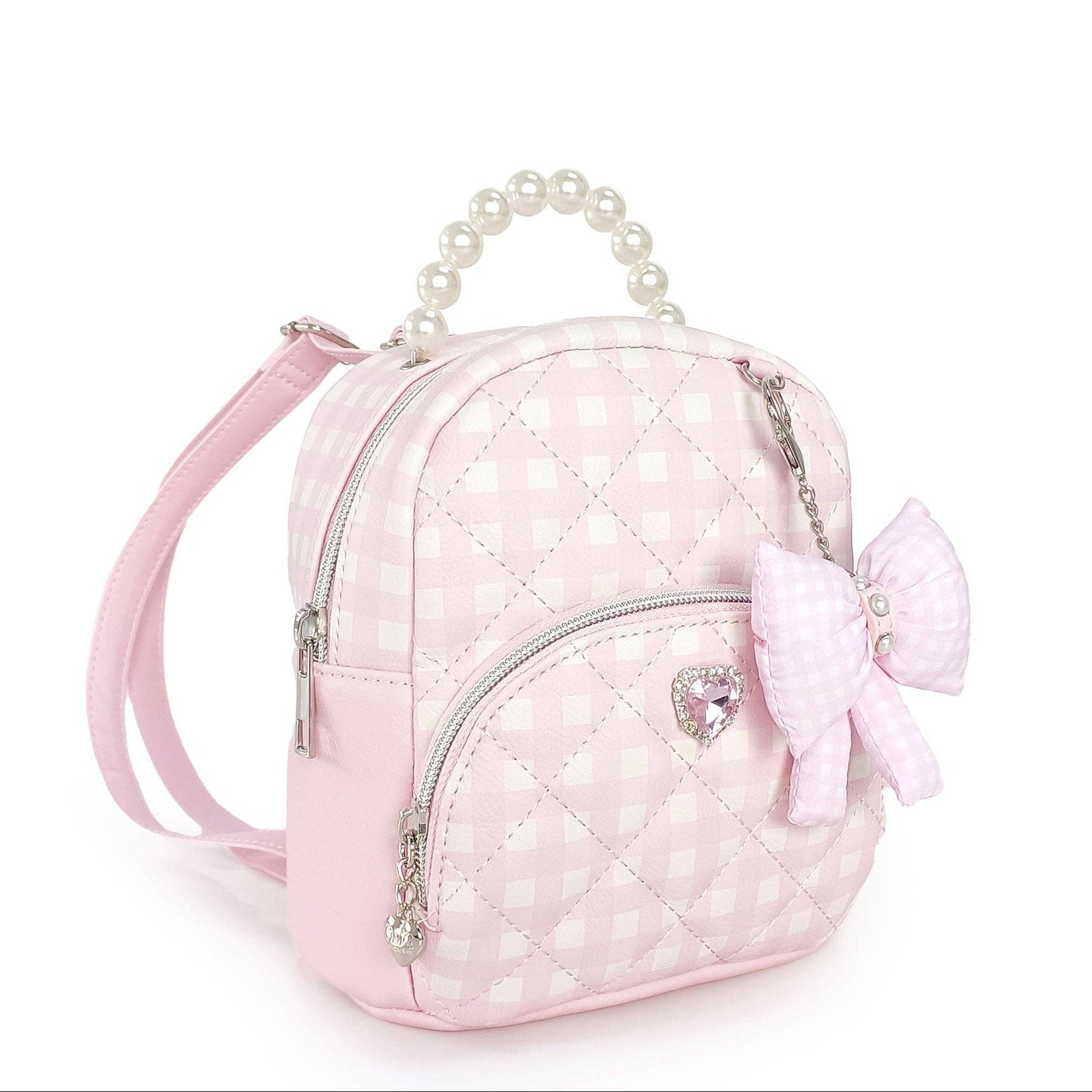 Pink quilted backpack with a bow and pearl handle on a white background