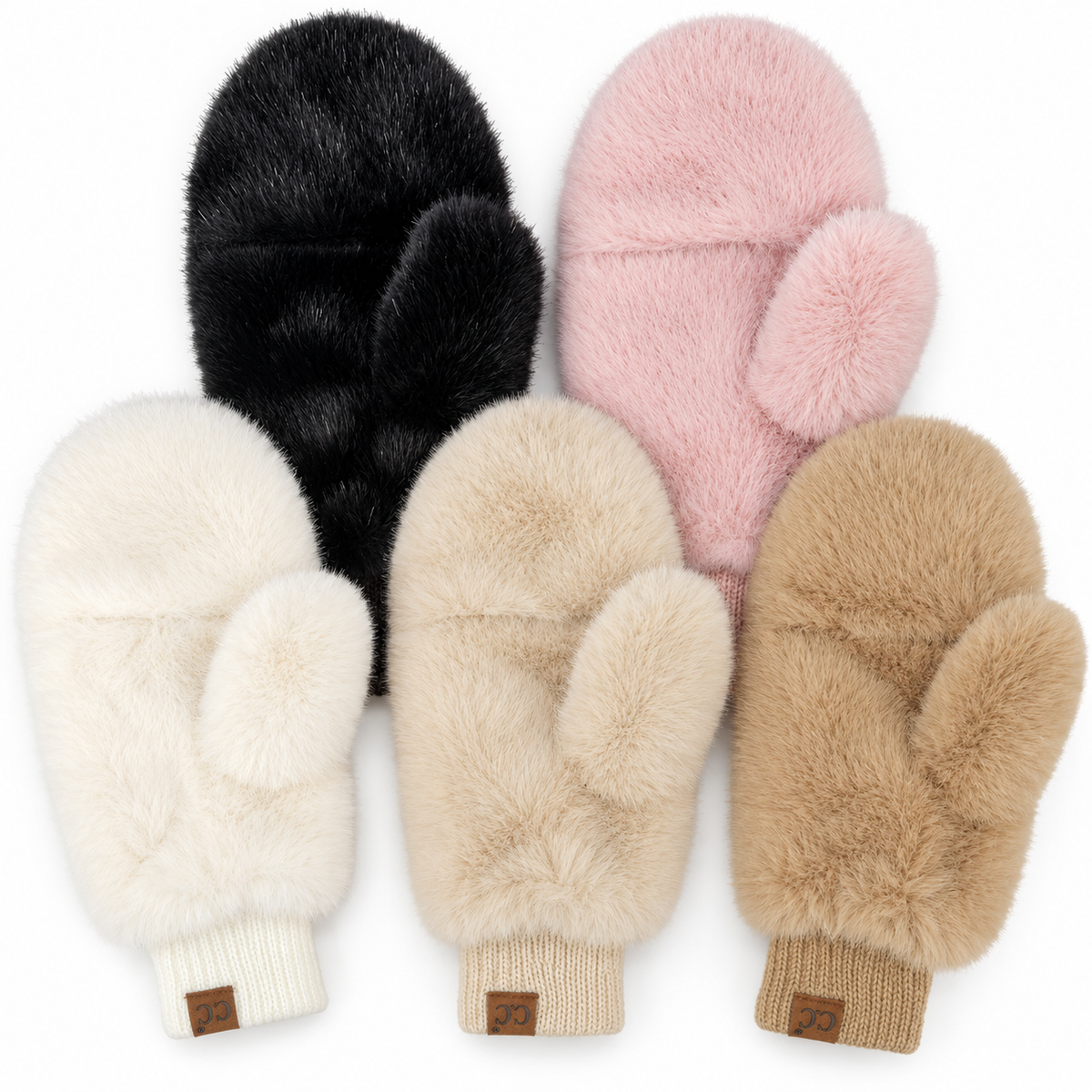 Five faux fur winter mittens arranged in two rows on a white background, featuring black, light pink, cream, and tan colors, each with a ribbed knit cuff and a small brown leather logo tab.