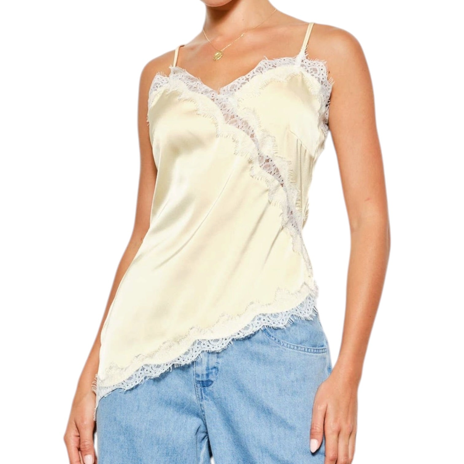 woman wearing yellow satin cami with white lace on white background