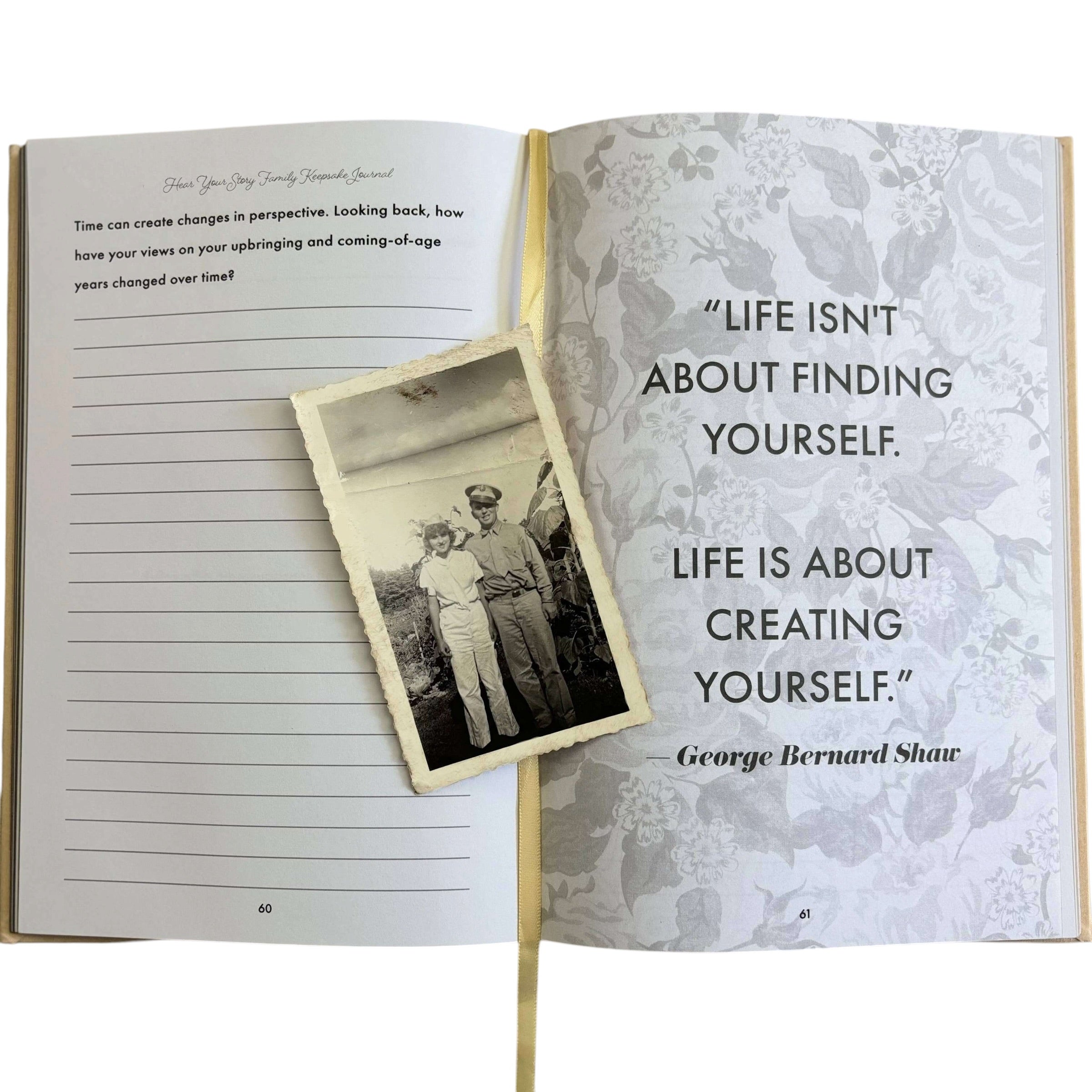 Open book with a photo of two people and a George Bernard Shaw quote on a white background