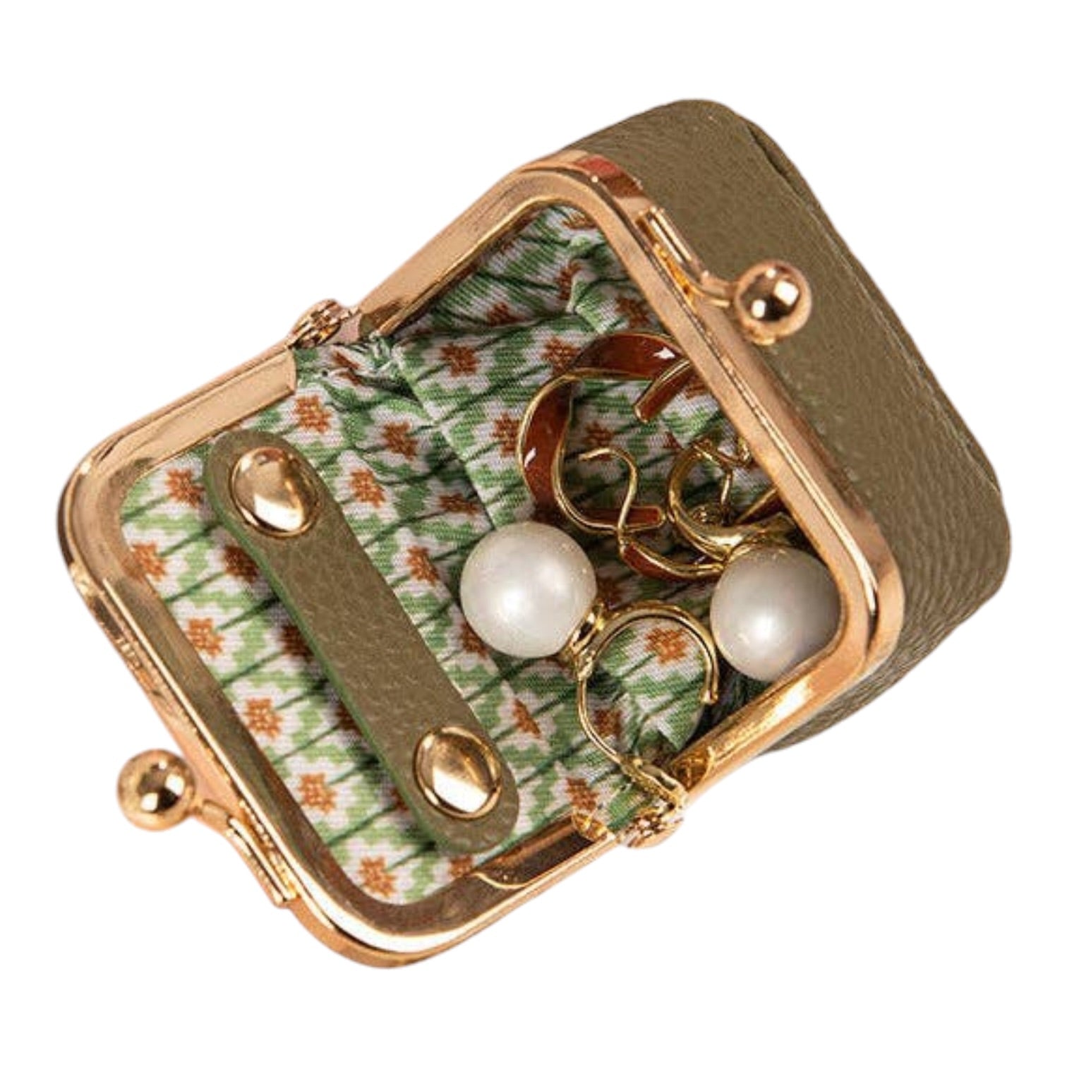 A small kiss-lock jewelry pouch with a green and white floral patterned fabric lining and a gold-tone metal frame. The pouch is shown open, containing sample jewelry including two white pearl earrings and gold rings, set against a plain white background.