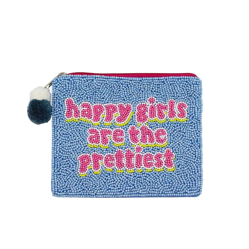 Blue pouch with 'Happy girls are the prettiest' text on a white background