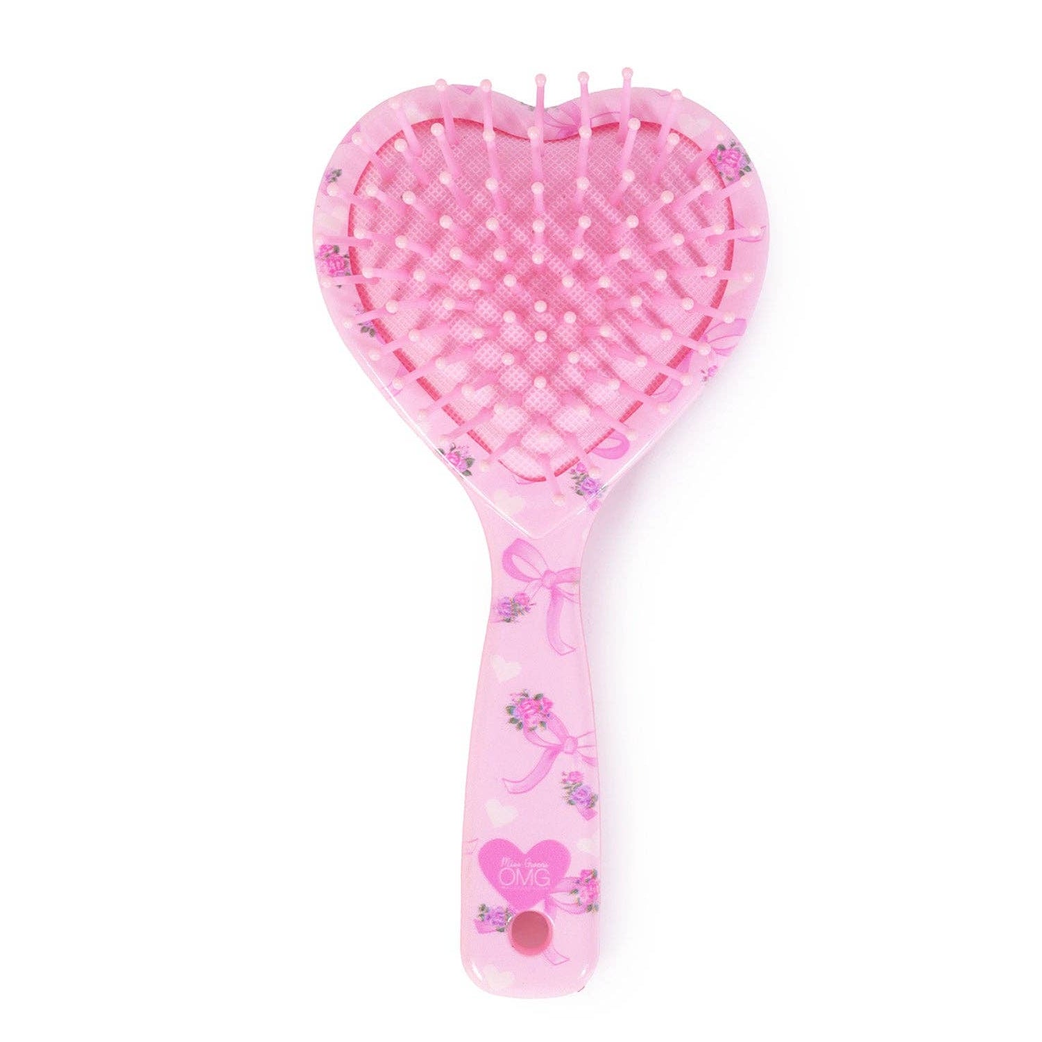 Heart-shaped hairbrush with floral design on a white background